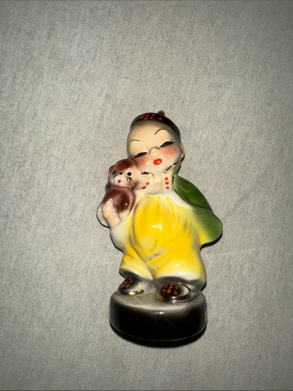 Vintage Collectible Ceramic Figurine with Yellow Outfit and Puppy - Unbranded